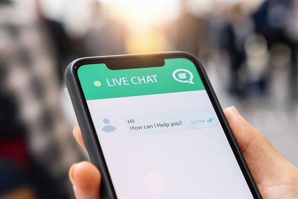 Closeup of live chat displayed on a smartphone