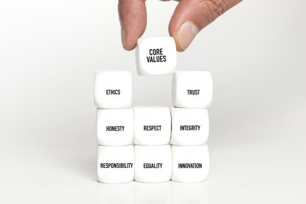 Stack of blocks with core values written on them