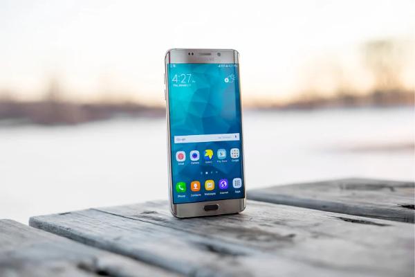 A phone against a blue background