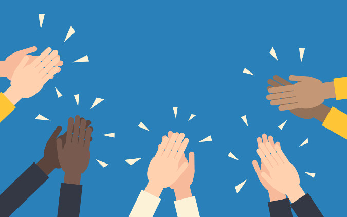 A graphic showing hands on a solid color background clapping. 