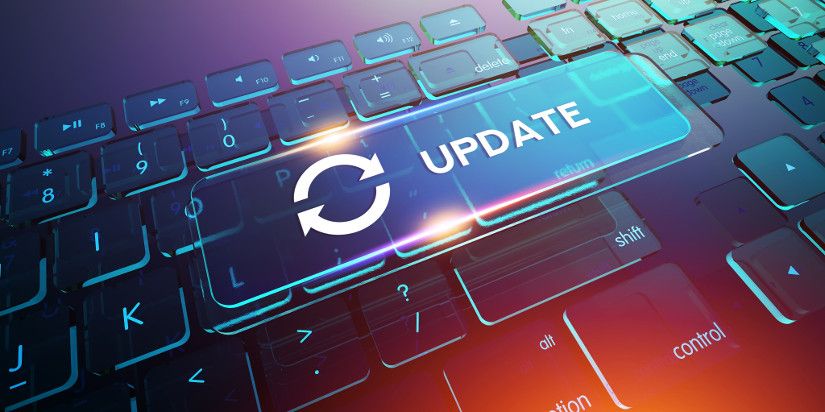 Image of a computer keyboard with the word update superimposed over it.