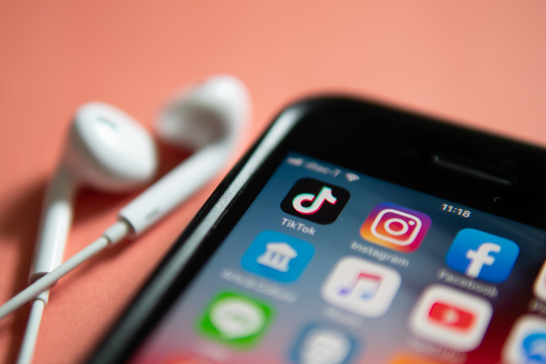 Image of a smartphone with the TikTok app icon highlighted
