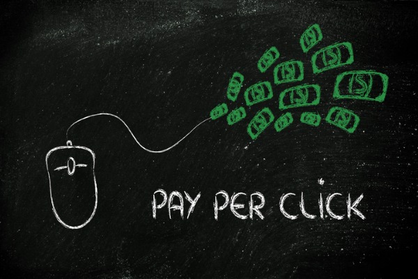 An image showing a computer mouse leading to money. 
